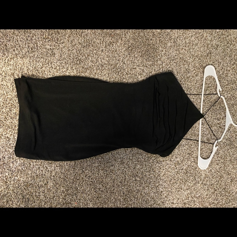 Black fitted cocktail dress.
